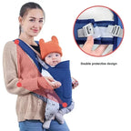 Woman holding a baby in a blue baby carrier with close-up of straps.