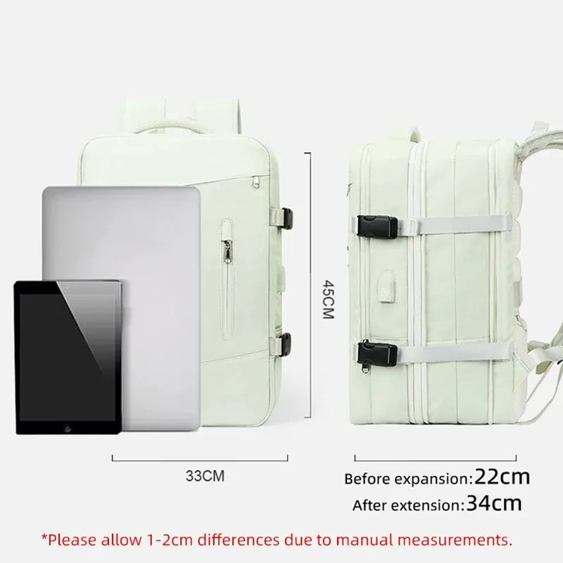 Light green extendible backpack with dimensions and an iPad for scale on a white background