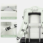Light green backpack with adjustable buckle and back zipper pocket on a white background