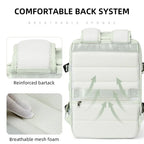 Light green backpack with text highlighting comfortable back system features on a white background
