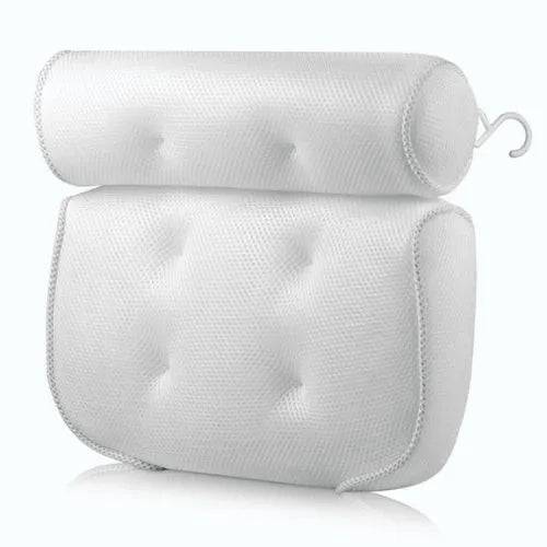 White bath pillow with mesh design on a white background
