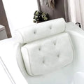 White bath pillow in bathtub