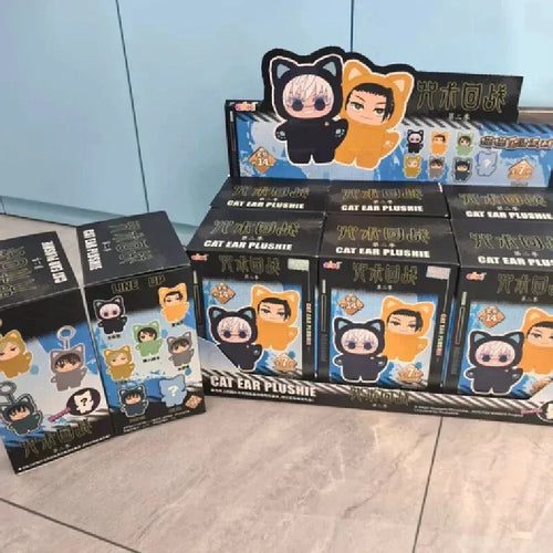 Display of cat ear plushie doll boxes on a light blue background