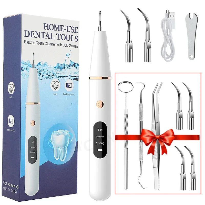 Home-use dental tools set with electric tooth cleaner, packaging, and additional tools.