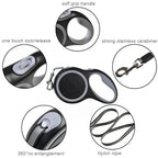 Retractable dog leash with features highlighted on a white background