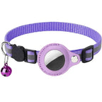 Purple reflective pet collar with airtag and bell on a white background