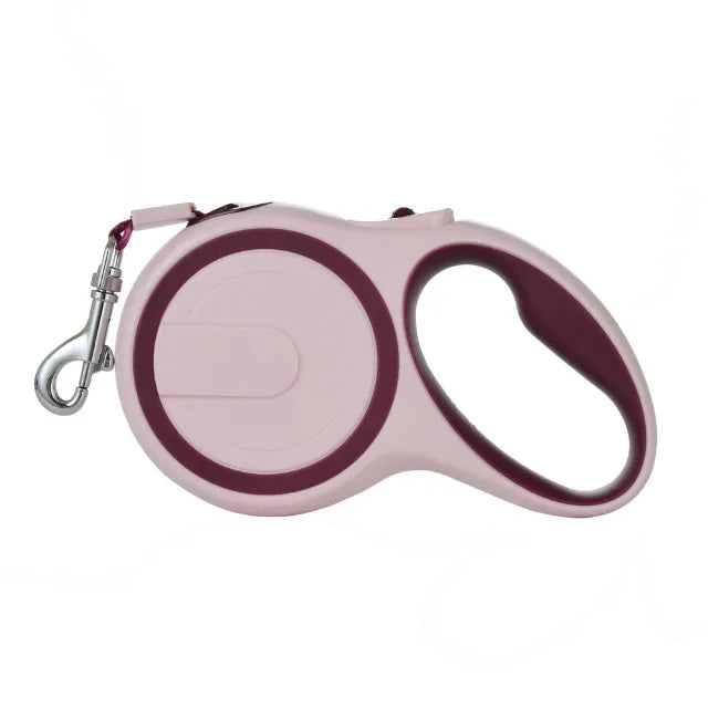 Wine red and pink retractable dog leash on a white background