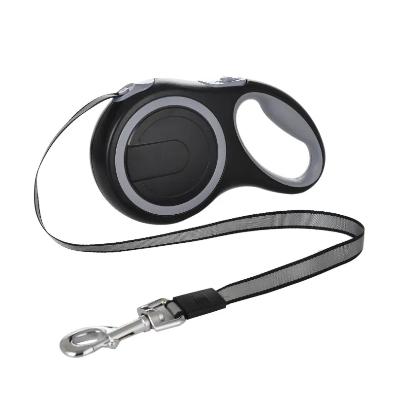 Retractable dog leash with black handle on a white background