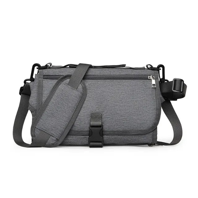Dark gray portable changing pad on white background