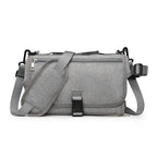 Light gray portable changing pad on white background