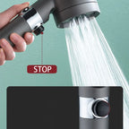 Handheld shower head with water flow and 'stop' button on a teal background
