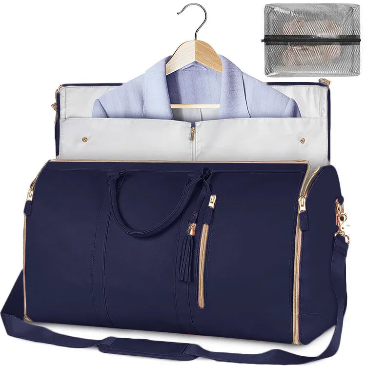 Navy blue travel bag with a blue shirt on a hanger and a clear pouch inside