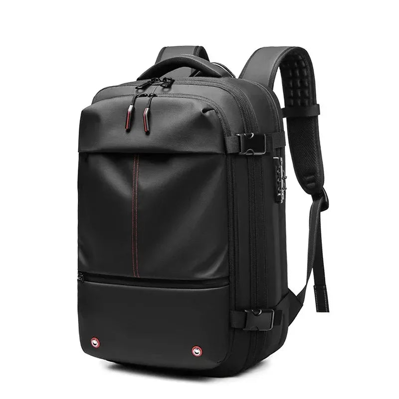 Black vacuum compression backpack with red accents on a white background