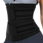 Black waist trainer worn by a person on a white background
